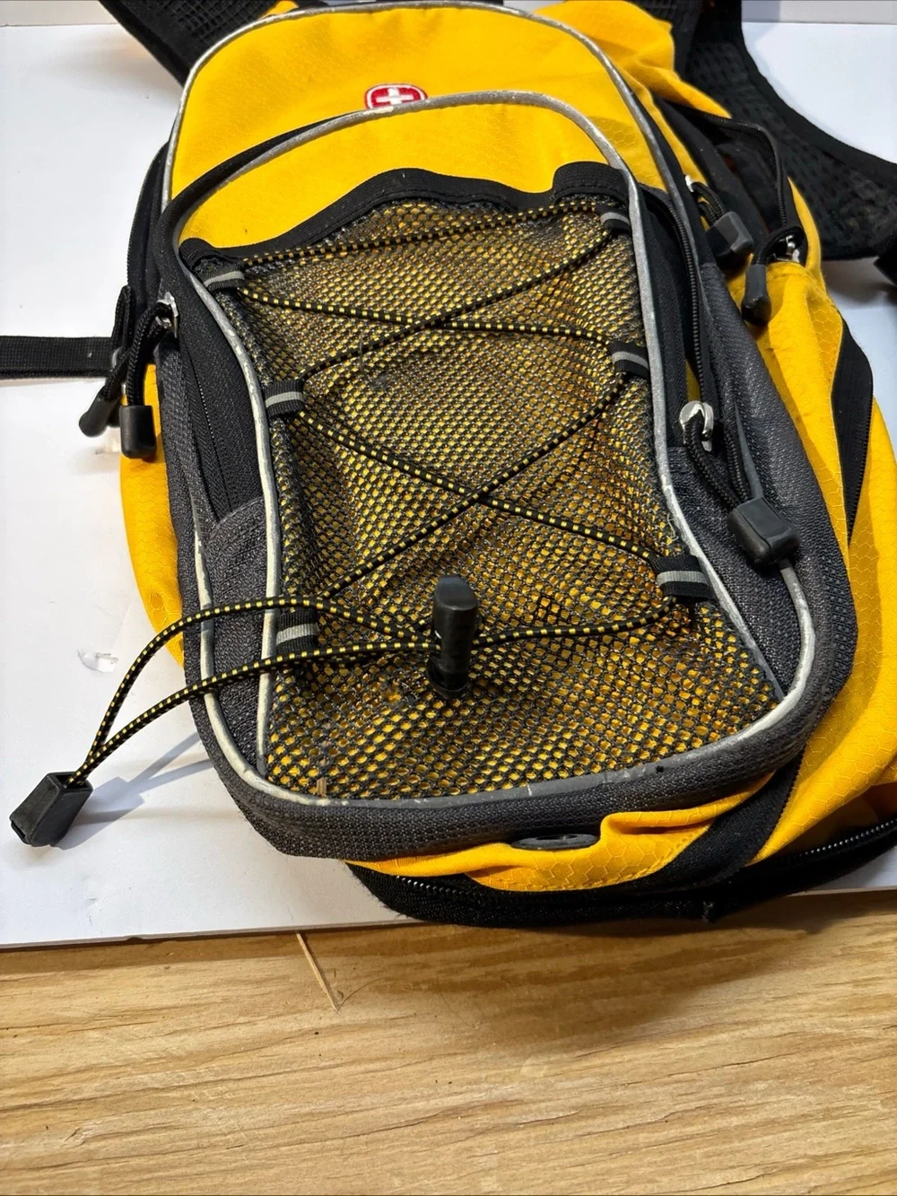 SwissGear unisex Yellow and Black Compact Daypack Backpack.